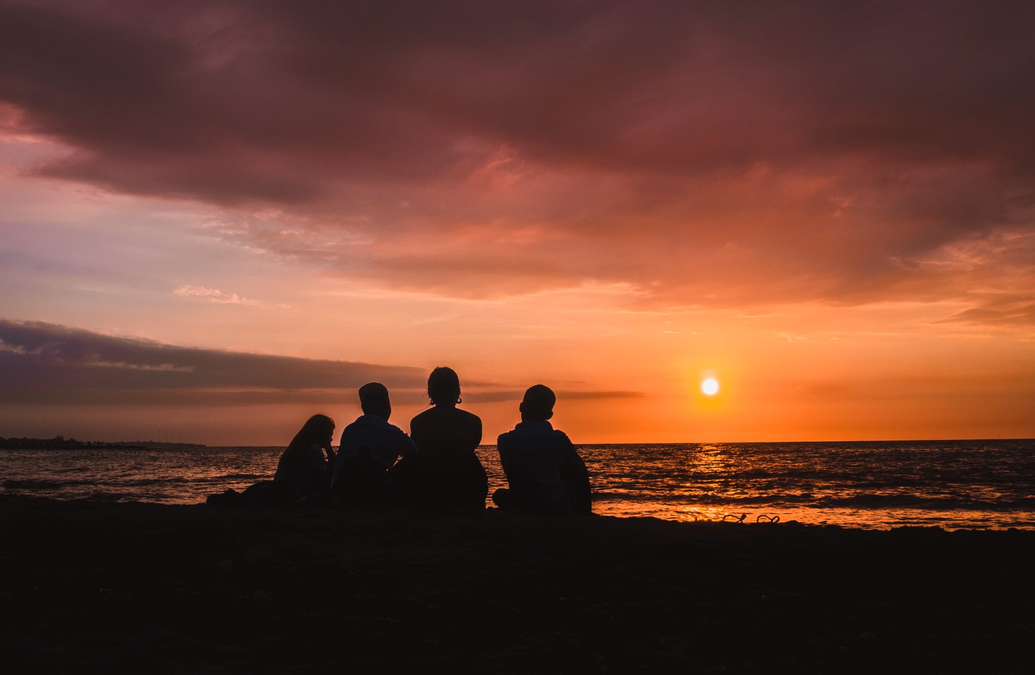 family enjoy sunset