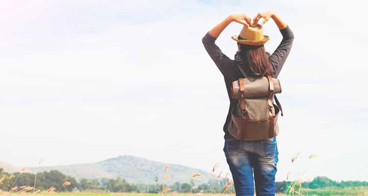 https://www.bonobology.com/wp-content/uploads/2021/05/happy-woman-traveler-looking-blue-sky-hands-love-sign-wanderlust-travel-concept-space-text.jpg